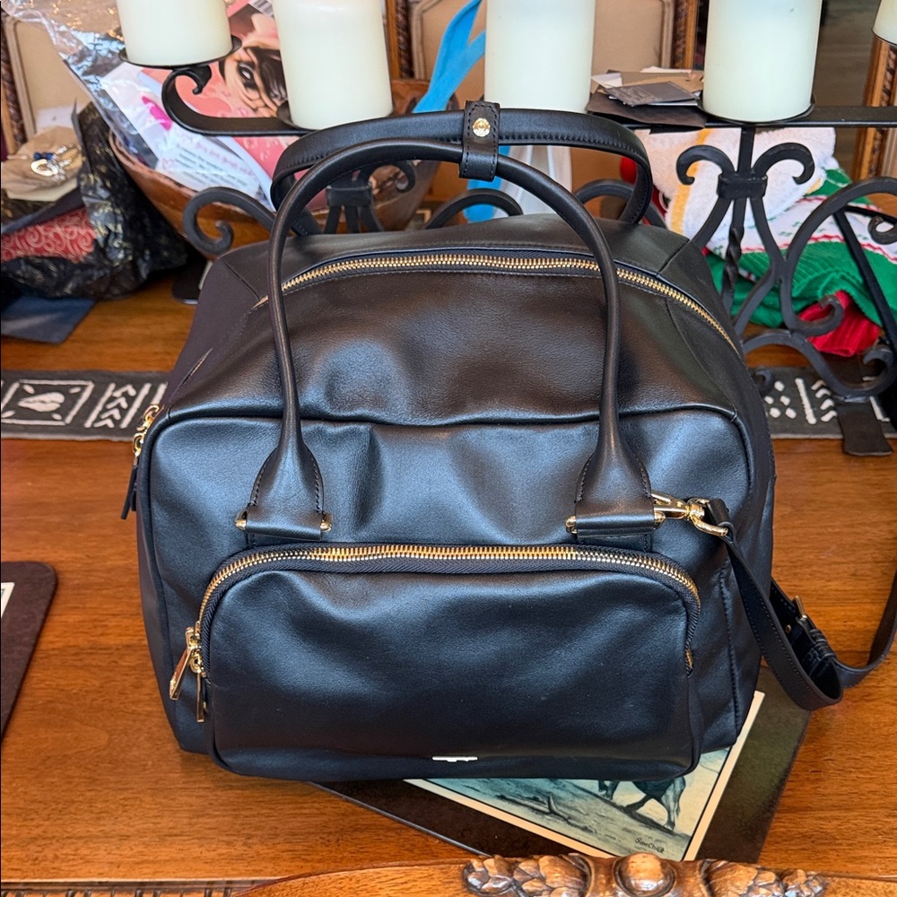 Stunning “TUMI” NWT Leather Travel Bag